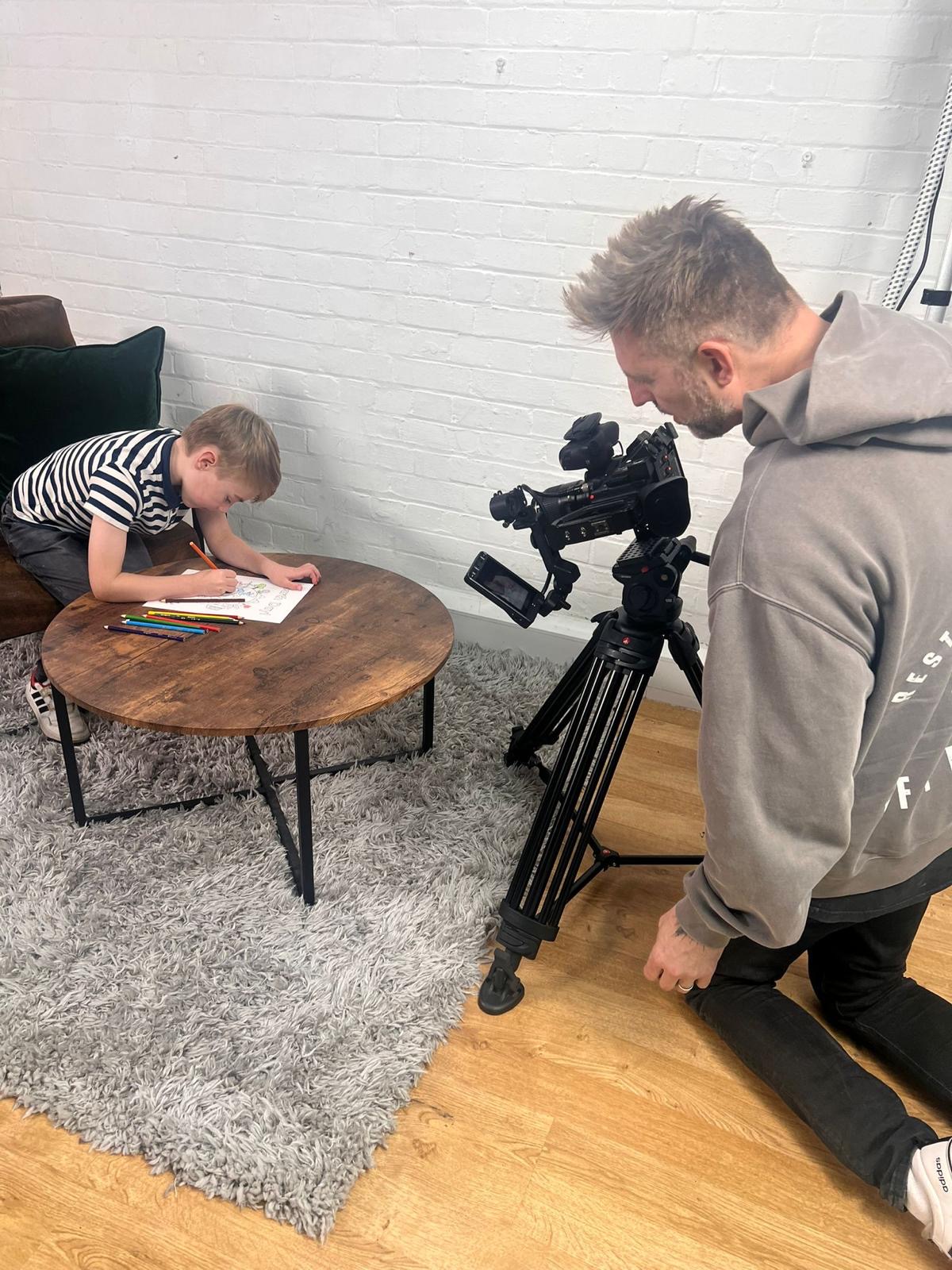 Professional photographer capturing brand imagery Professional photographer capturing brand imagery